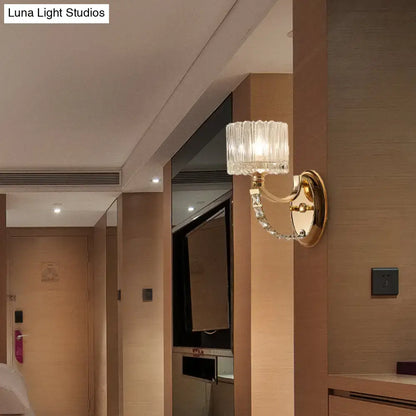 Decorbites brass faceted glass sconce wall-mounted with ribbed shade and curved crystal arm on Tampa Home & Garden Store