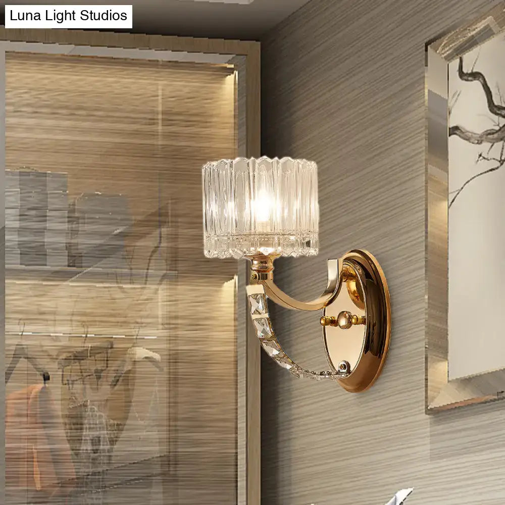 Brass faceted glass wall sconce with crystal chain accent by Decorbites on Tampa Home & Garden Store
