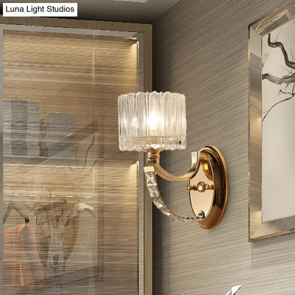 Brass faceted glass wall sconce with crystal chain accent by Decorbites on Tampa Home & Garden Store