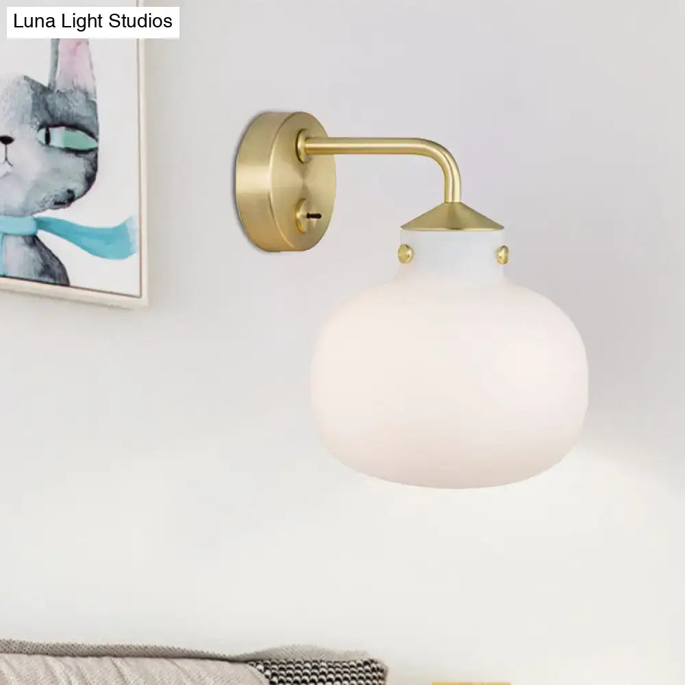 Brass milk glass balcony sconce with curved arm, round backplate by Decorbites on Tampa Home & Garden Store