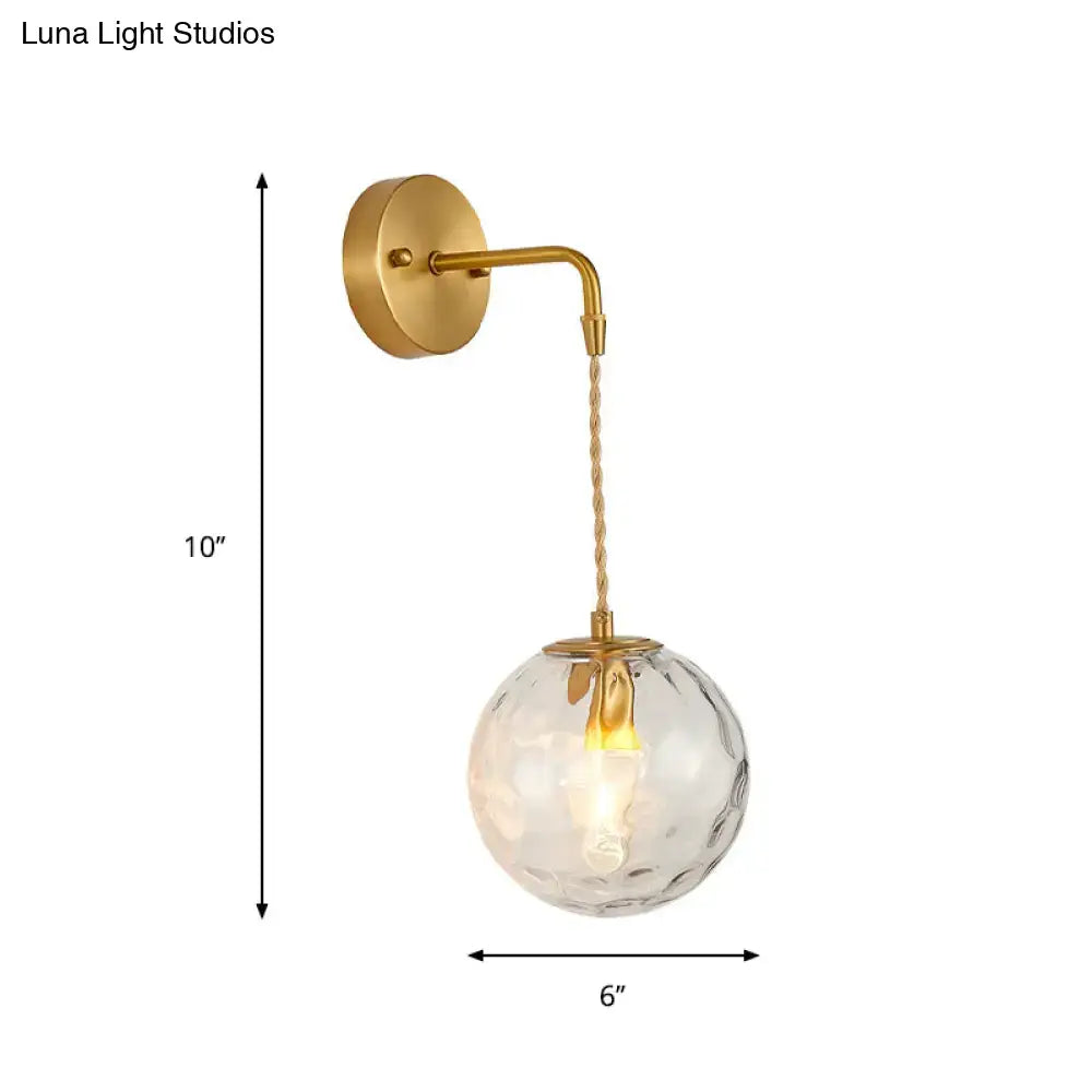 Brass Water Glass Sconce by Decorbites, gold-tone finish, clear textured glass globe on Tampa Home & Garden Store
