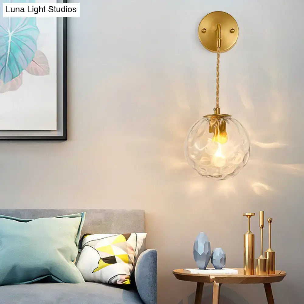 Brass Water Glass Sconce with faceted clear glass globe and rope suspension by Decorbites on Tampa Home & Garden Store