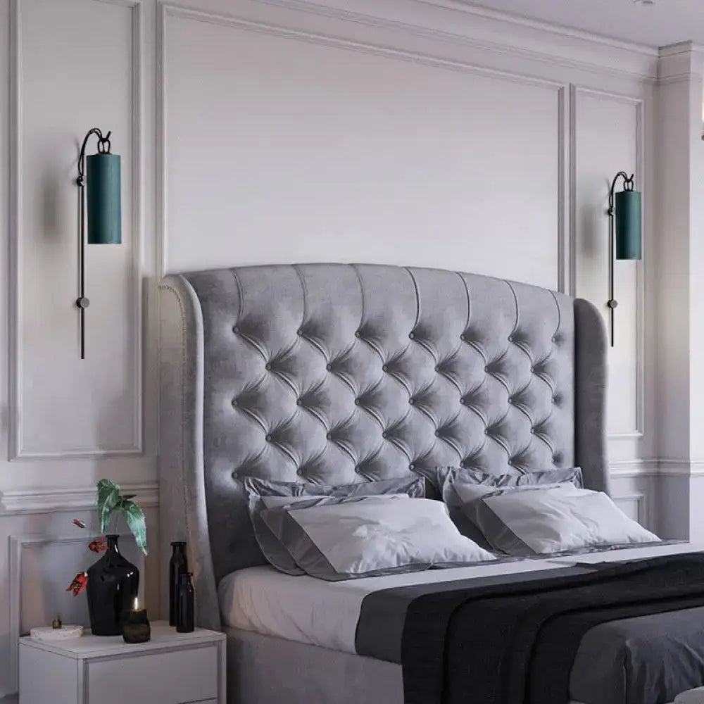 Brass White Tube Sconce by Decorbites; teal glass shade, pair of sconces by tufted headboard on Tampa Home & Garden Store