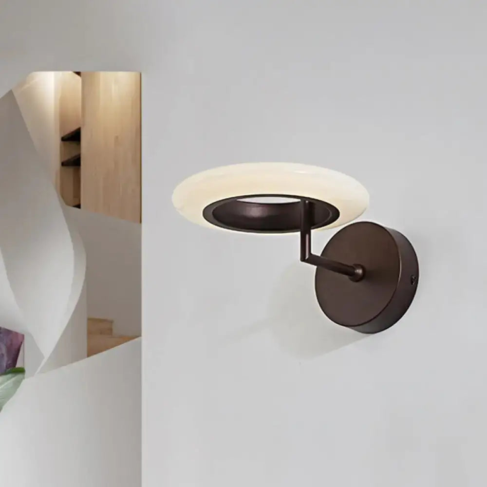 Bronze round LED wall lamp by Decorbites with a circular frosted shade on Tampa Home & Garden Store
