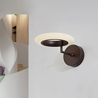 Bronze round LED wall lamp by Decorbites with a circular frosted shade on Tampa Home & Garden Store