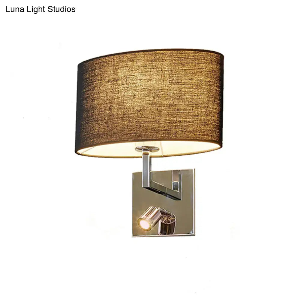 Brown fabric shade wall sconce with chrome square backplate and adjustable light on Tampa Home & Garden Store
