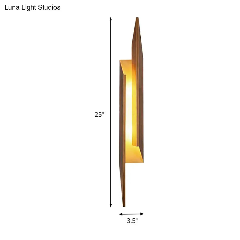 Brown metal geometric sconce by Decorbites with warm amber glow, 25in tall, 3.5in wide on Tampa Home & Garden Store
