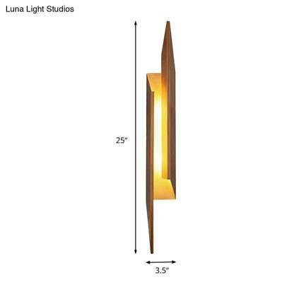 Brown metal geometric sconce by Decorbites with warm amber glow, 25in tall, 3.5in wide on Tampa Home & Garden Store