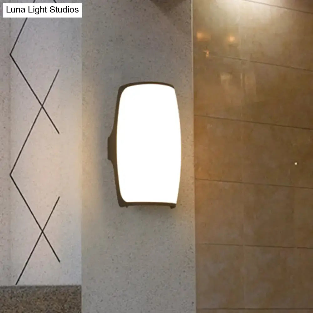 Brown rectangular LED wall light with frosted diffuser mounted on textured column on Tampa Home & Garden Store