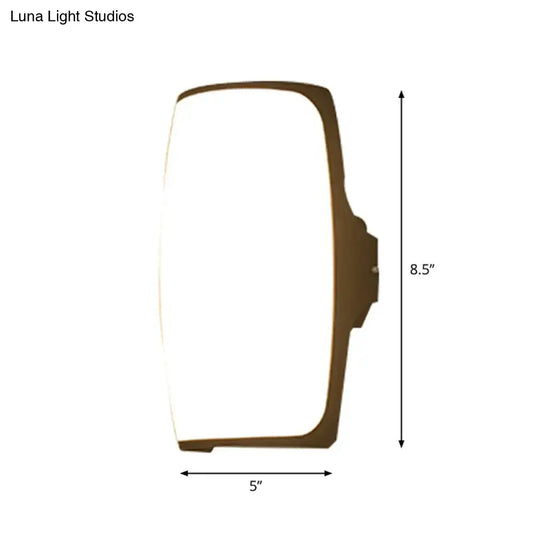 Decorbites brown rectangular LED wall light with curved frame, 5 in wide, 8.5 in tall on Tampa Home & Garden Store