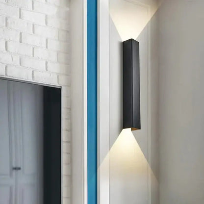 Modern brushed aluminum rectangular wall sconce by Decorbites, bedroom ambient light on Tampa Home & Garden Store