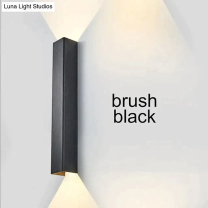 Modern brushed aluminum rectangular wall sconce with ambient light by Decorbites on Tampa Home & Garden Store