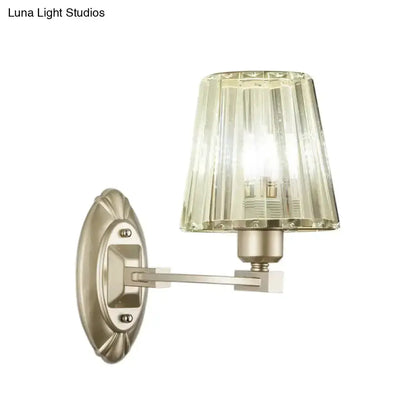Modern brushed brass and green glass wall sconce by Decorbites for bedroom lighting on Tampa Home & Garden Store