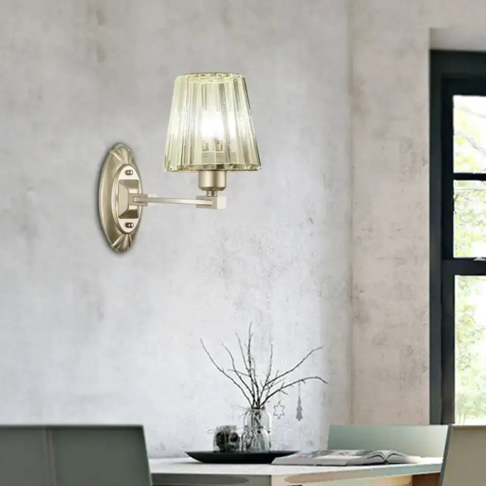 Modern brushed brass wall sconce with green glass shade, single adjustable arm Decorbites on Tampa Home & Garden Store