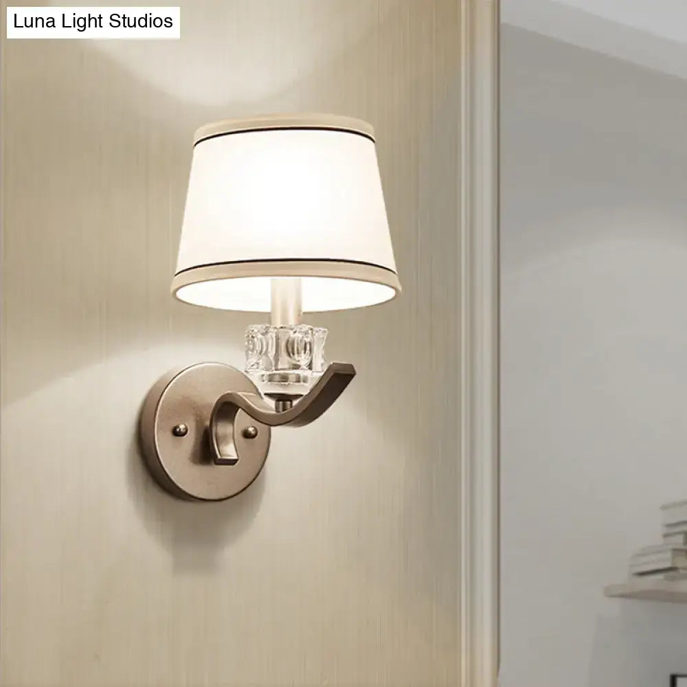Brushed brass wall sconce with crystal block and white fabric shade Decorbites hallway lighting on Tampa Home & Garden Store
