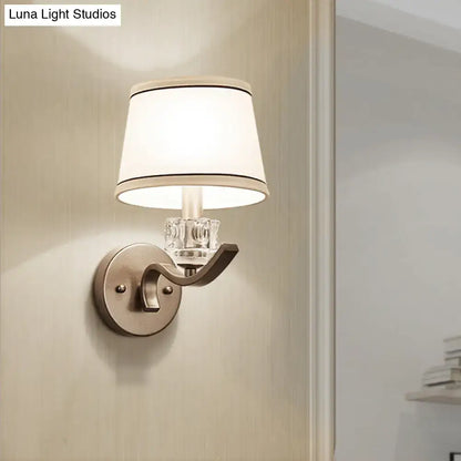 Brushed brass wall sconce with crystal block and white fabric shade Decorbites hallway lighting on Tampa Home & Garden Store
