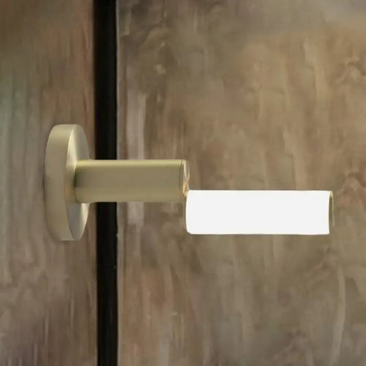 Gold metal wall light by Decorbites with brass finish and rectangular frosted shade on Tampa Home & Garden Store