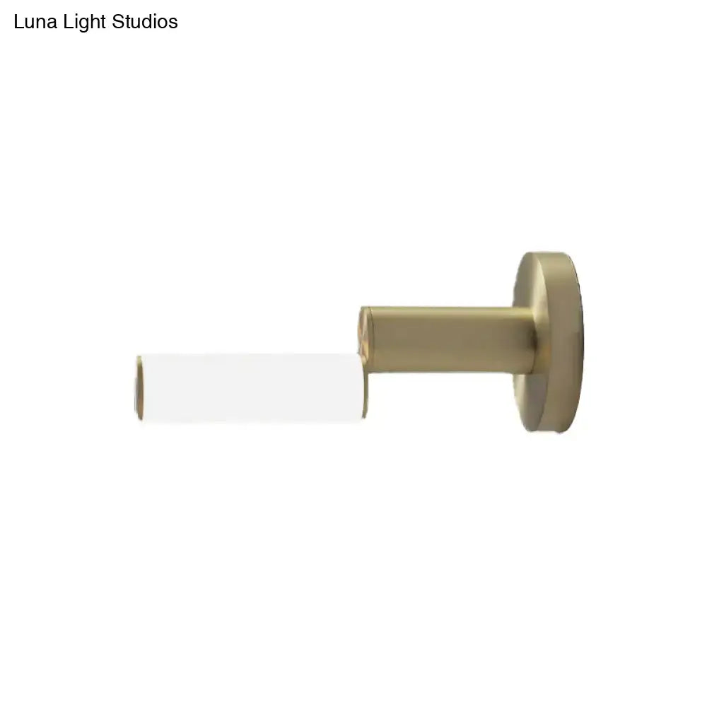 Gold metal wall light with white cylindrical shade Decorbites modern fixture on Tampa Home & Garden Store