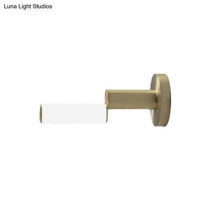 Gold metal wall light with white cylindrical shade Decorbites modern fixture on Tampa Home & Garden Store