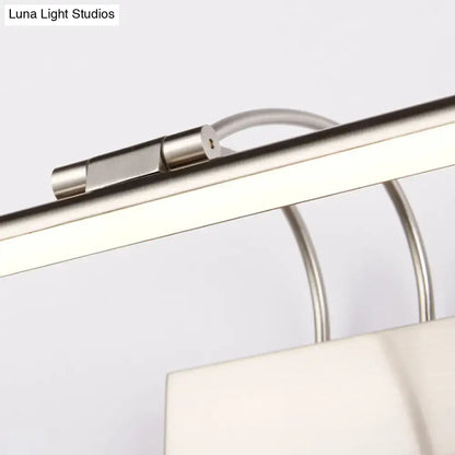 Modern brushed brass LED bathroom wall light sconce with curved arm and white shade on Tampa Home & Garden Store