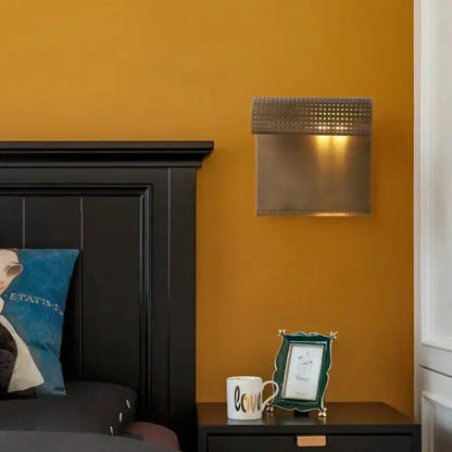 Modern brushed brass scrolled wall sconce by Decorbites for bedroom lighting on Tampa Home & Garden Store