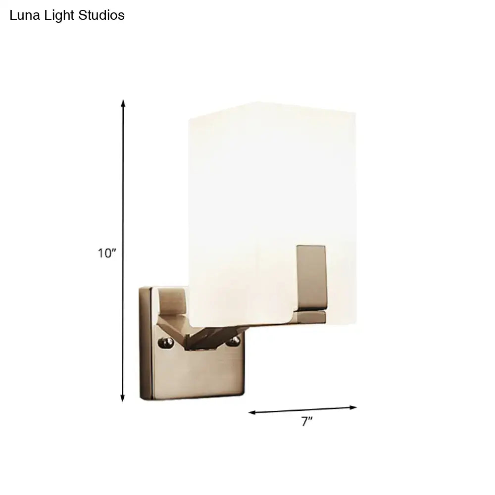Brass frosted glass sconce by Decorbites, wall-mounted with rectangular shade on Tampa Home & Garden Store