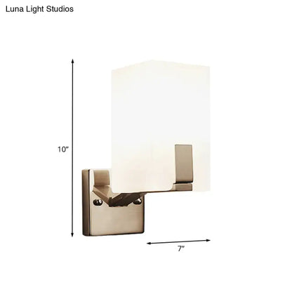 Brass frosted glass sconce by Decorbites, wall-mounted with rectangular shade on Tampa Home & Garden Store