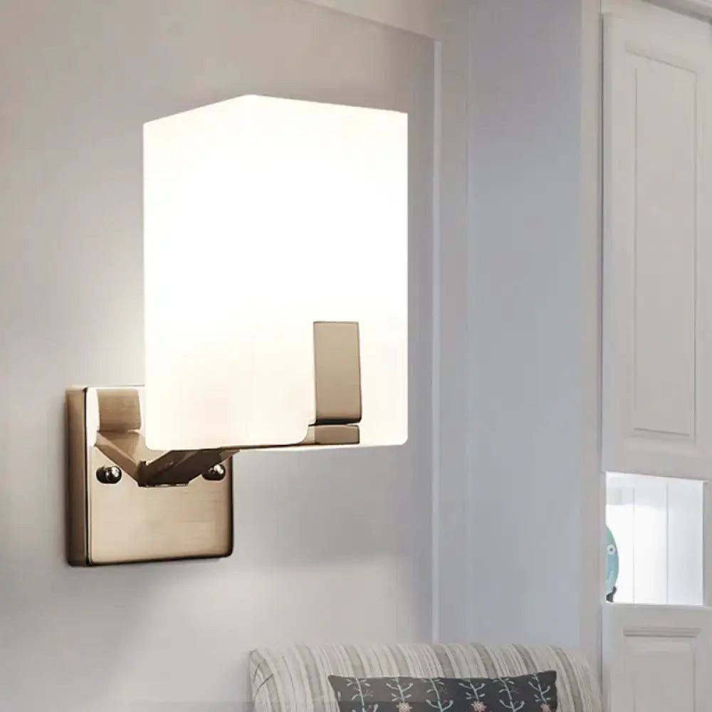 Brass frosted glass sconce by Decorbites, wall-mounted with rectangular shade on Tampa Home & Garden Store