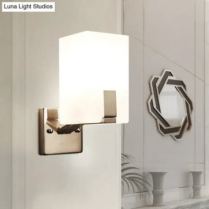 Brass frosted glass wall sconce with square backplate on Tampa Home & Garden Store