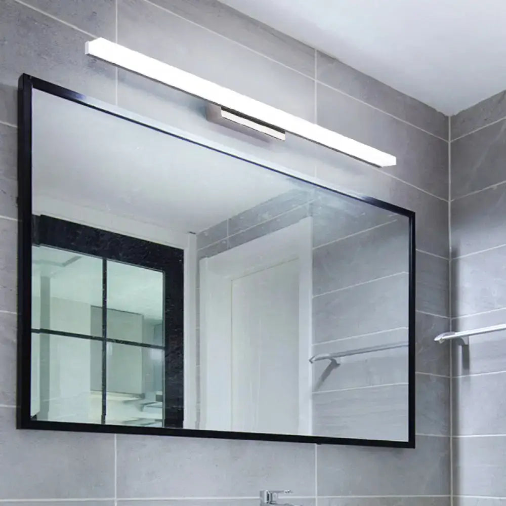 Nickel Linear Vanity Light by Decorbites over a modern grey tile bathroom mirror on Tampa Home & Garden Store