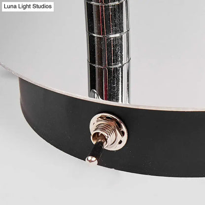 Nickel wall sconce light with chrome stem and black base by Decorbites on Tampa Home & Garden Store