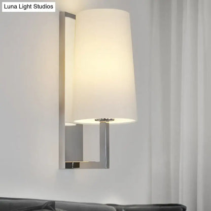 Nickel wall sconce light with white shade and rectangular backplate by Decorbites on Tampa Home & Garden Store