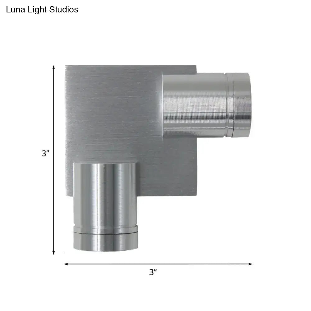 Silver brushed-metal L-shaped wall sconce with cylindrical arm, 3x3 in on Tampa Home & Garden Store