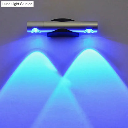 Silver LED Wall Sconce Pink by Decorbites with chrome finish emitting blue wall glow on Tampa Home & Garden Store