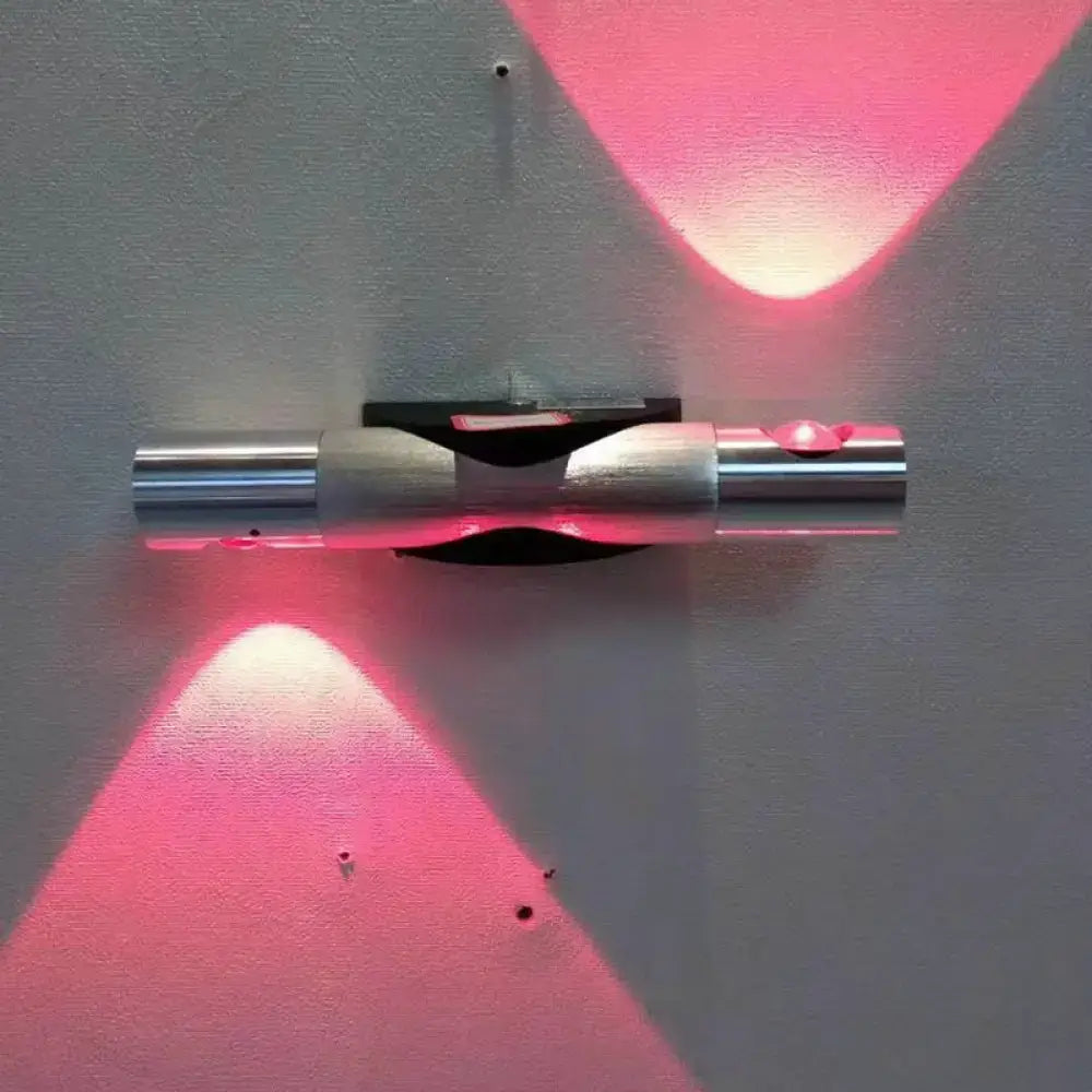 Decorbites silver LED wall sconce with pink glow and chrome cylindrical design on Tampa Home & Garden Store