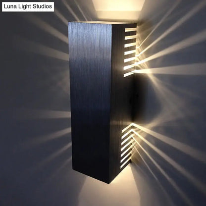Silver wall light sconce by Decorbites with brushed metal finish and slatted glow on Tampa Home & Garden Store