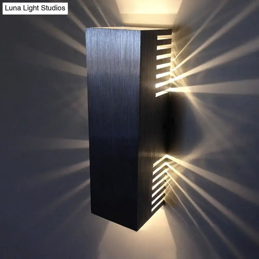 Silver wall light sconce by Decorbites with brushed metal finish and slatted glow on Tampa Home & Garden Store