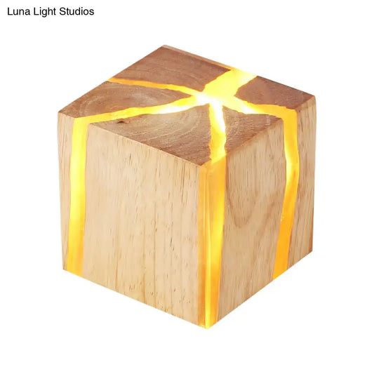 Wooden cube wall light with wood grain and warm amber glow along cracks by Decorbites on Tampa Home & Garden Store
