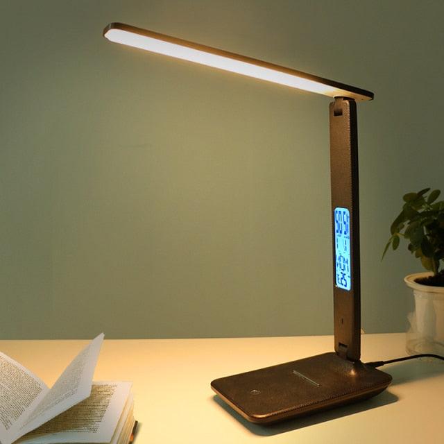 Stevvex desk lamp with foldable arm, dark wood-tone base and blue digital clock/calendar display on Tampa Home & Garden Store