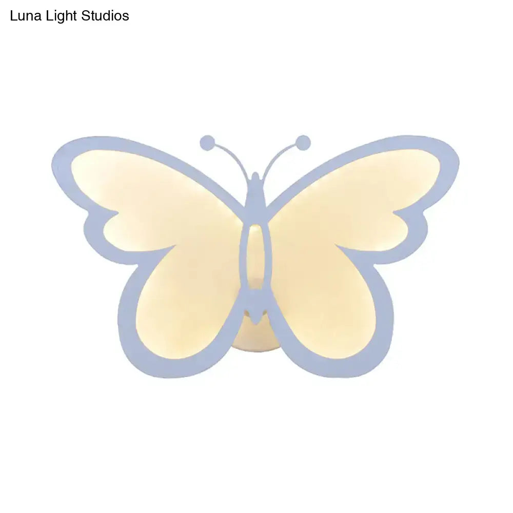 White acrylic butterfly wall sconce with blue outline and backlit glow, one- or three-light on Tampa Home & Garden Store