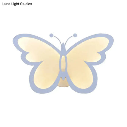 White acrylic butterfly wall sconce with blue outline and backlit glow, one- or three-light on Tampa Home & Garden Store