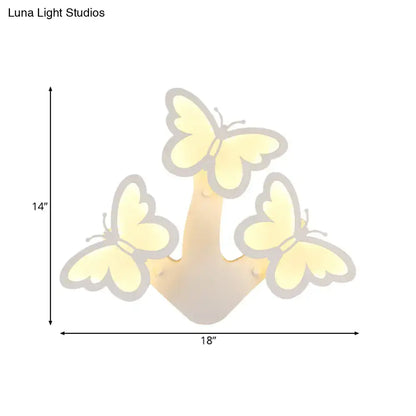 White acrylic wall sconce with butterfly accents and soft glow, 1-3 light by Decorbites on Tampa Home & Garden Store