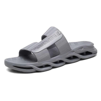 Stevvex gray memory-foam slide slippers with dual straps and sculpted wavy sole on Tampa Home & Garden Store