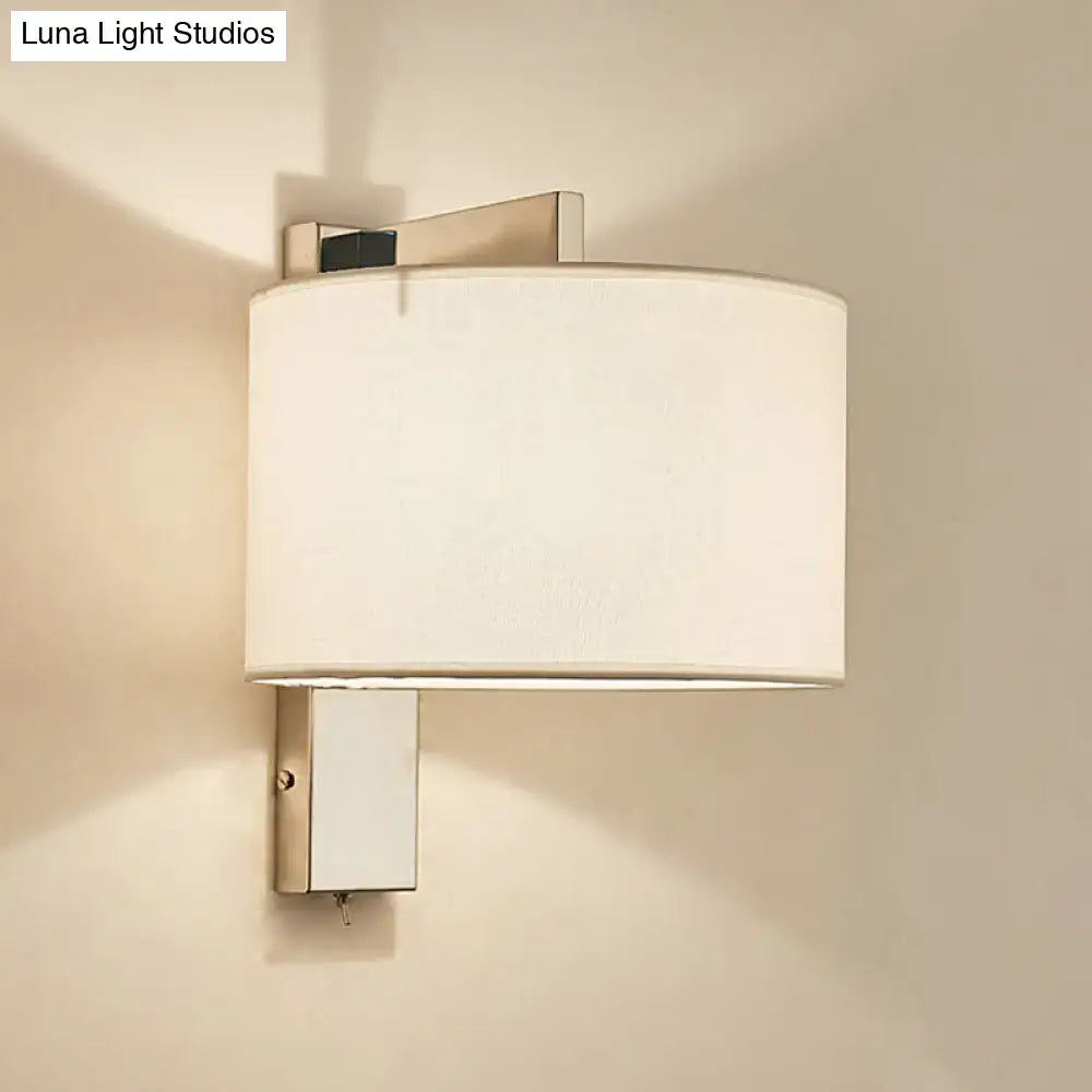 Charcoal drum fabric sconce wall light with metal backplate on Tampa Home & Garden Store