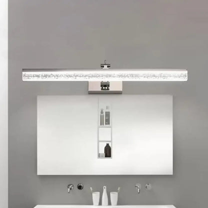 Modern chrome adjustable LED vanity light by Decorbites above a white bathroom mirror on Tampa Home & Garden Store
