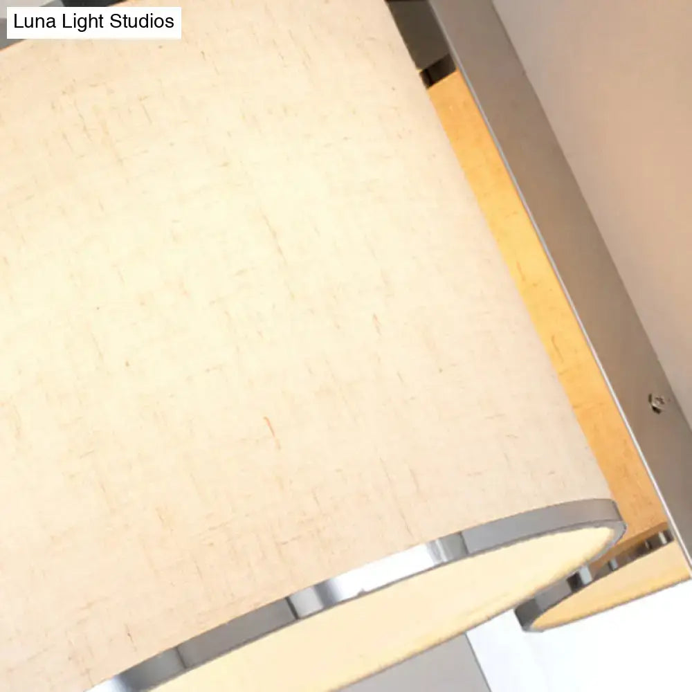 Chrome Fabric Drum Sconce with beige shade and chrome trim by Decorbites on Tampa Home & Garden Store