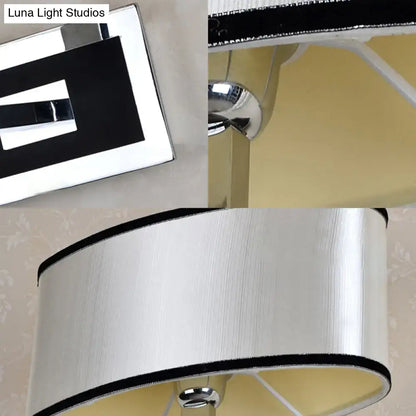 Chrome oval wall sconce by Decorbites with white drum shade and chrome finish on Tampa Home & Garden Store
