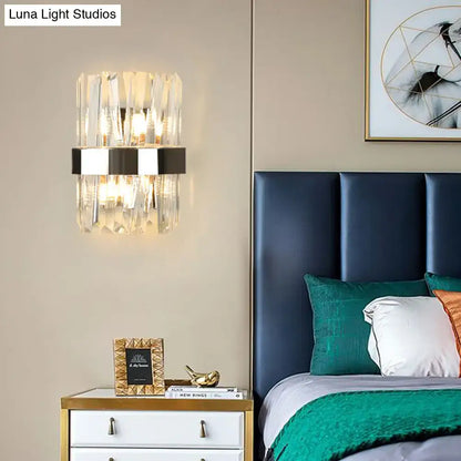 Chrome crystal wall sconce single-bulb by Decorbites with crystal prisms in modern bedroom on Tampa Home & Garden Store