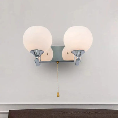 Chrome Cream Glass Pull-Chain Sconce by Decorbites with dual frosted glass globes on Tampa Home & Garden Store