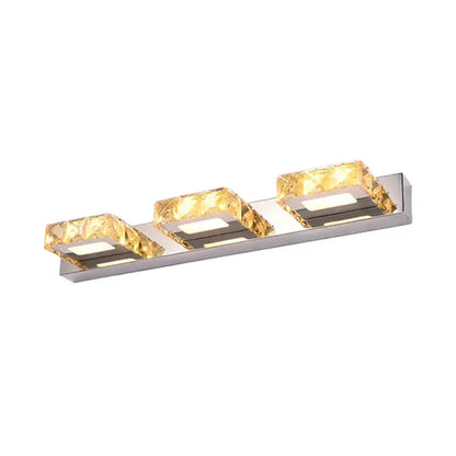 Chrome gold crystal vanity light with three square crystal blocks on a metal bar by Decorbites on Tampa Home & Garden Store
